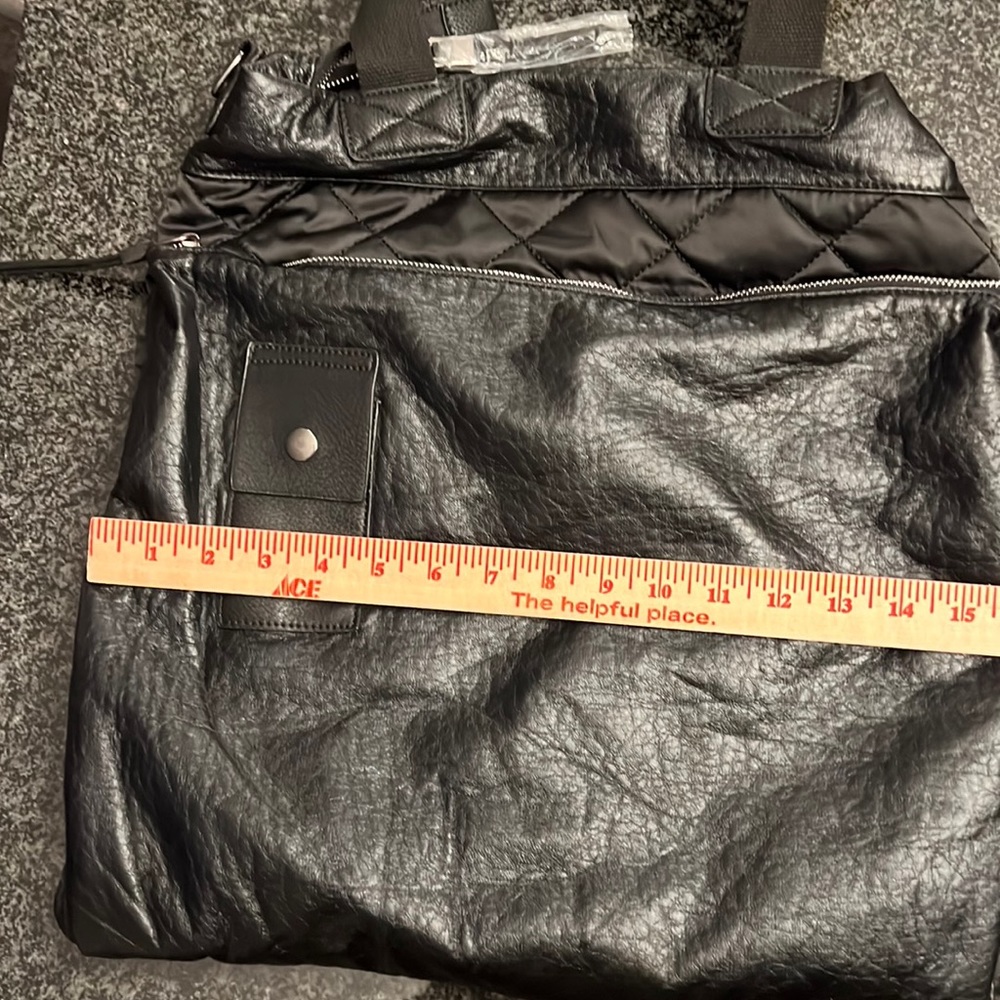 ChillX tote bag. Black vegetation leather one side & fabric other.